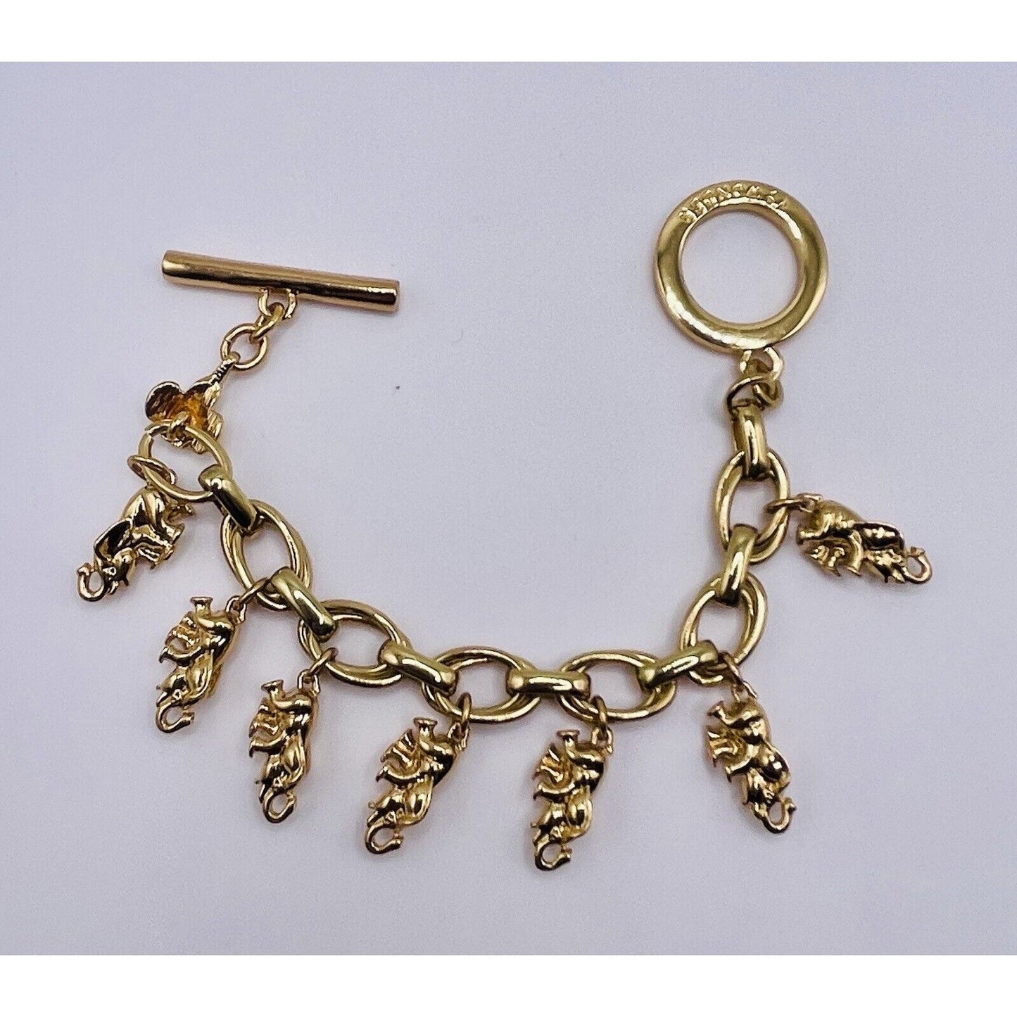C. WONDER GOLD TONE ELEPHANT CHARM 7.5" TOGGLE BRACELET SUPER CUTE