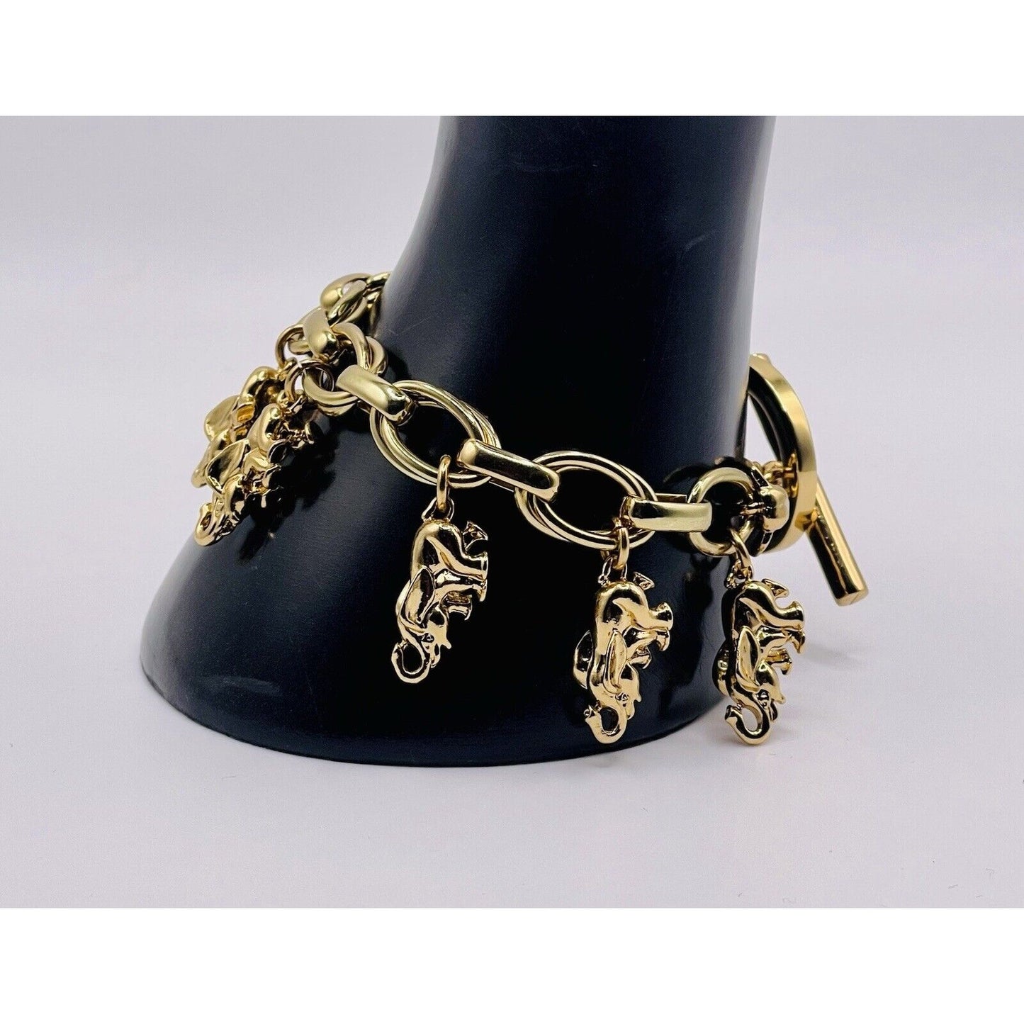 C. WONDER GOLD TONE ELEPHANT CHARM 7.5" TOGGLE BRACELET SUPER CUTE