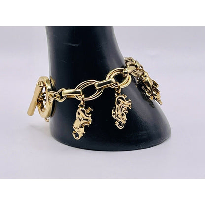 C. WONDER GOLD TONE ELEPHANT CHARM 7.5" TOGGLE BRACELET SUPER CUTE